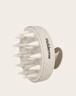 Scalp stimulating brush